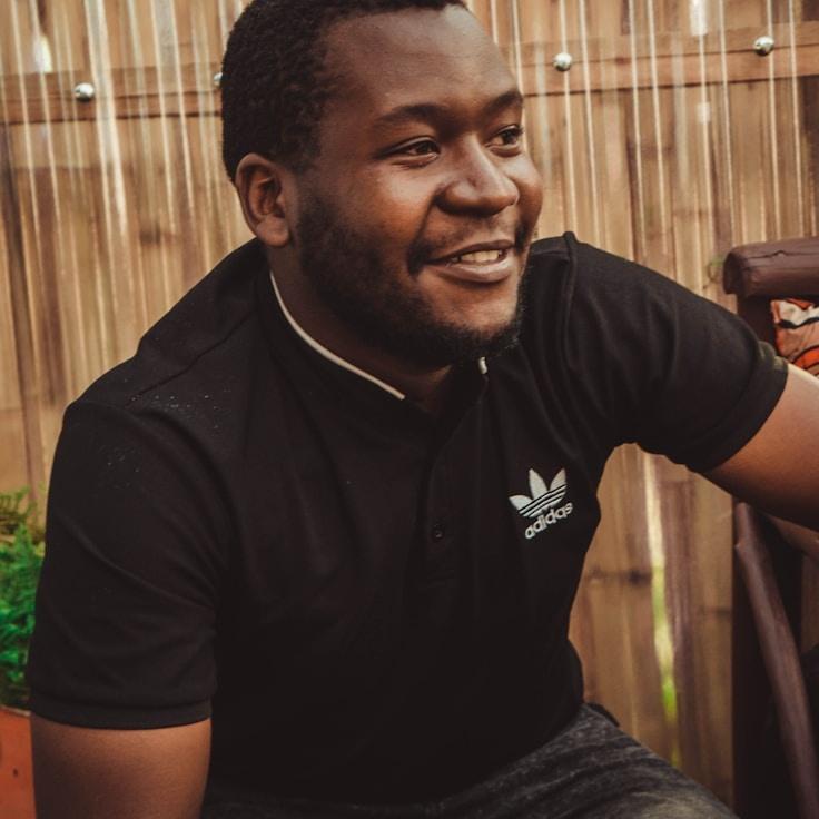 Ava Singh, Lead Design Curator at FoxPodLab, reviewing corporate floral arrangements